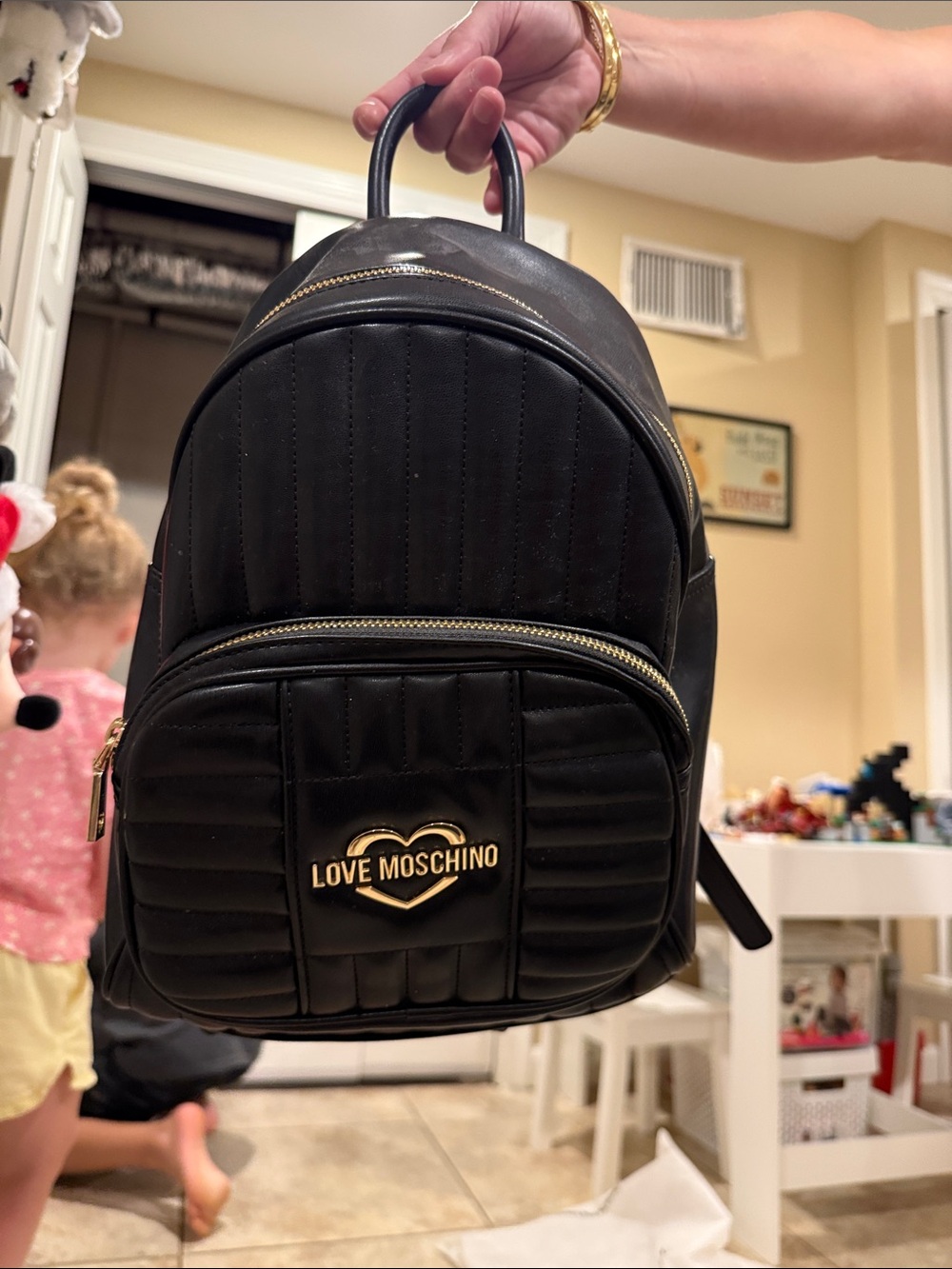 Love Moschino Black Quilted Mini Backpack with Gold Logo